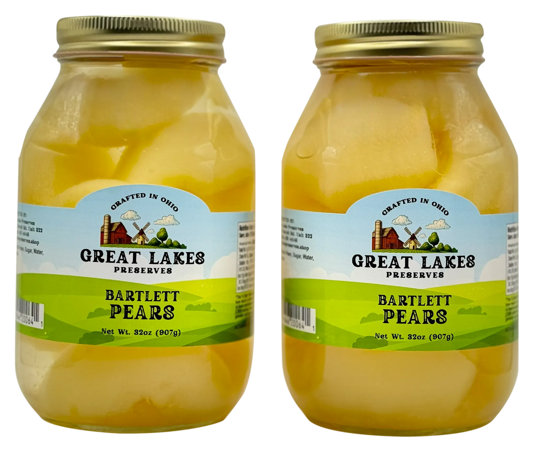 Two Great Lakes Preserves Bartlett Pears jars, 32 oz (907g) each, front labels facing with gold lids.