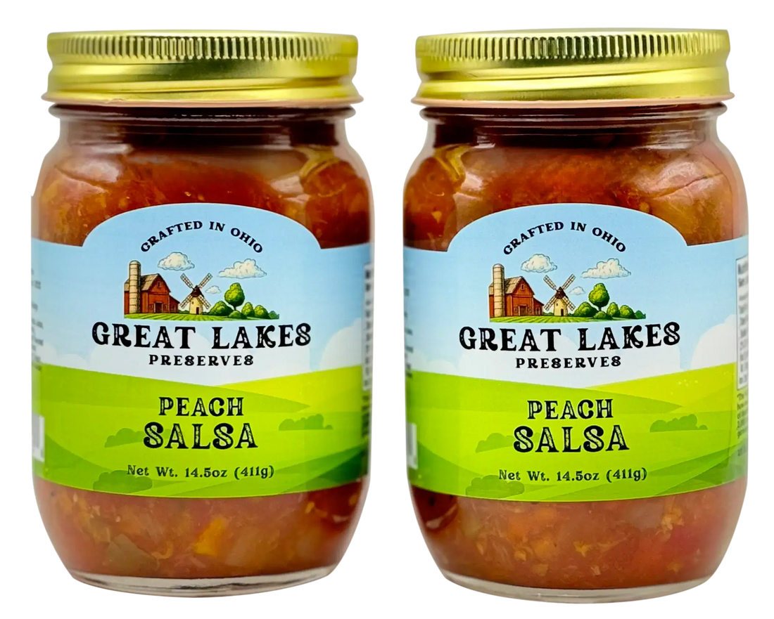 Two Great Lakes Preserves Peach Salsa jars with gold lids, 14.5 oz (411g), front labels facing.