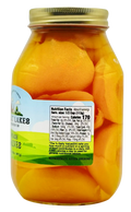 Back of Peach Halves jar with Nutrition Facts: serving 1/2 cup (113g), 170 calories; refrigerate after opening.