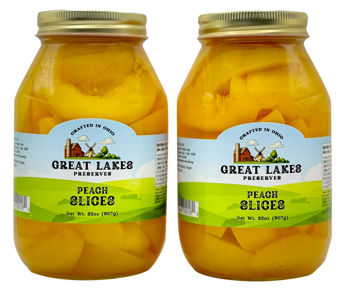 Two Great Lakes Preserves Peach Slices jars, 32 oz (907g) each, front labels facing with gold lids.