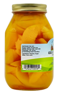 Back label of Great Lakes Preserves Peach Slices jar showing ingredients list and barcode under gold lid.