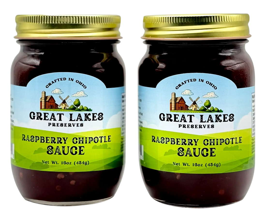Two Great Lakes Preserves Raspberry Chipotle Sauce jars, 18 oz (454g) each, front labels shown with gold lids.