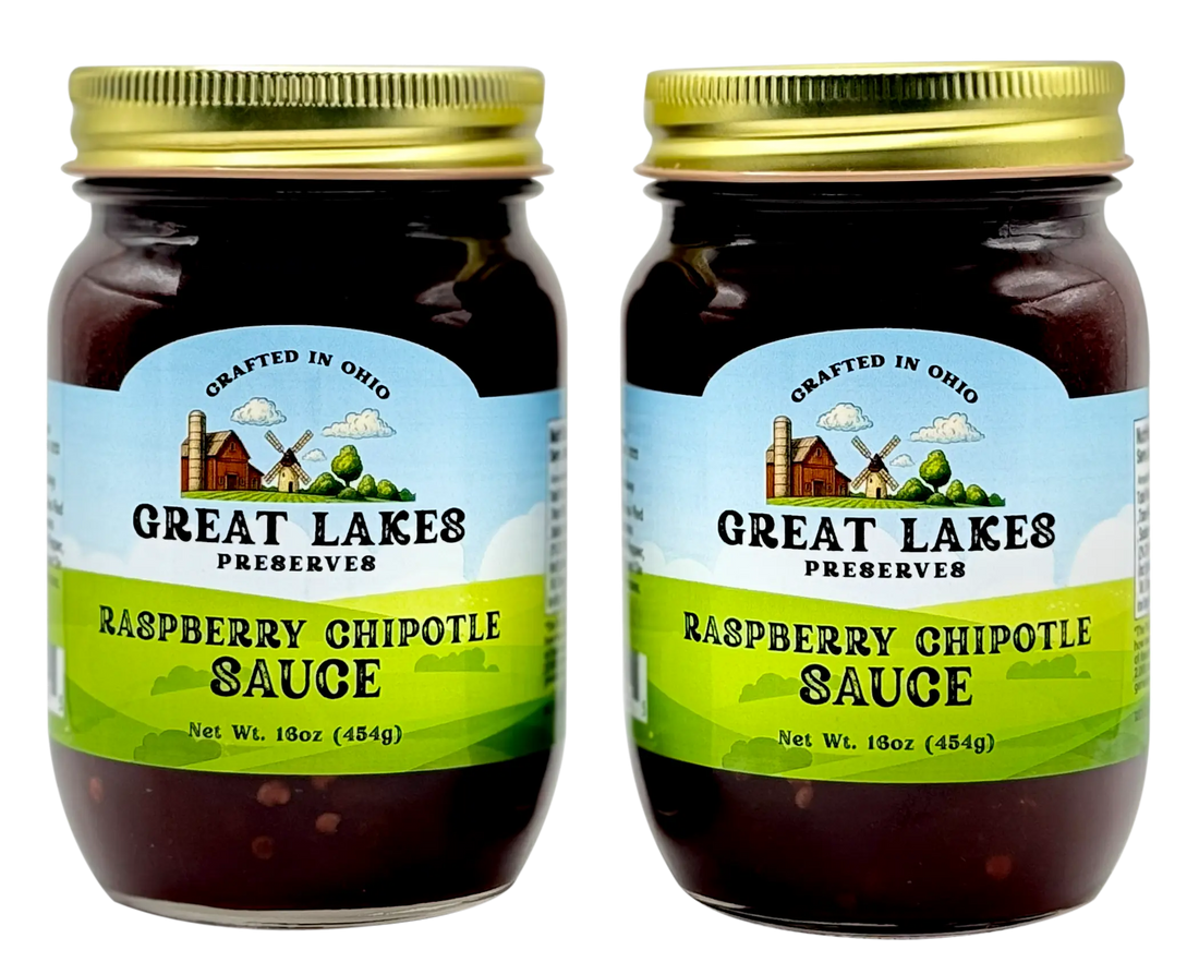 Two Great Lakes Preserves Raspberry Chipotle Sauce jars, 18 oz (454g) each, front labels shown with gold lids.
