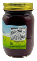 Back of jar shows Nutrition Facts; serving size 1 Tbsp (14g), 15 calories; refrigerate after opening.
